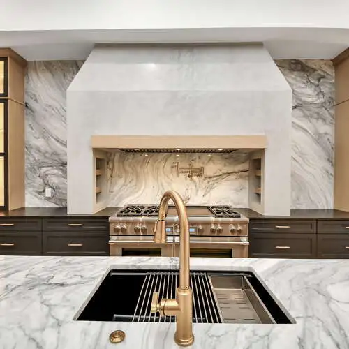 Sophisticated Kitchen Design with Elite Tiles and Warm Contemporary Finishes