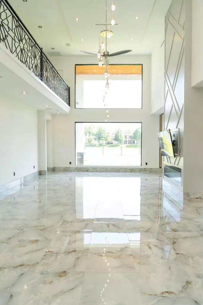 Stunning sky blue 24x48 porcelain tiles in a cozy living room create a relaxing oasis Stunning sky blue 24x48 porcelain tiles in a cozy living room create a relaxing oasis