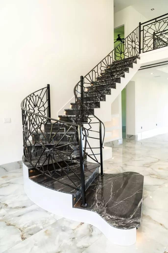 Luxurious granite stairs and 24x48 polish porcelain tiles make a stunning statement in any home Luxurious granite stairs and 24x48 polish porcelain tiles make a stunning statement in any home